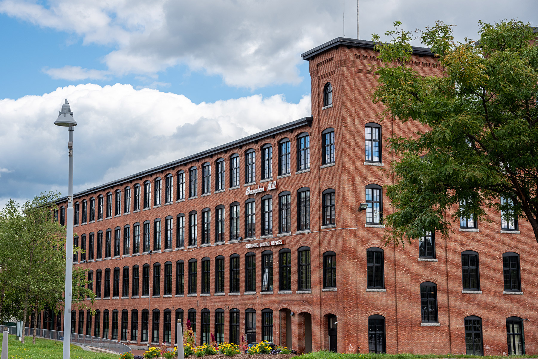 The exterior of Champlain Mill in Winooski, a renovated mill building that houses offices and restaurants